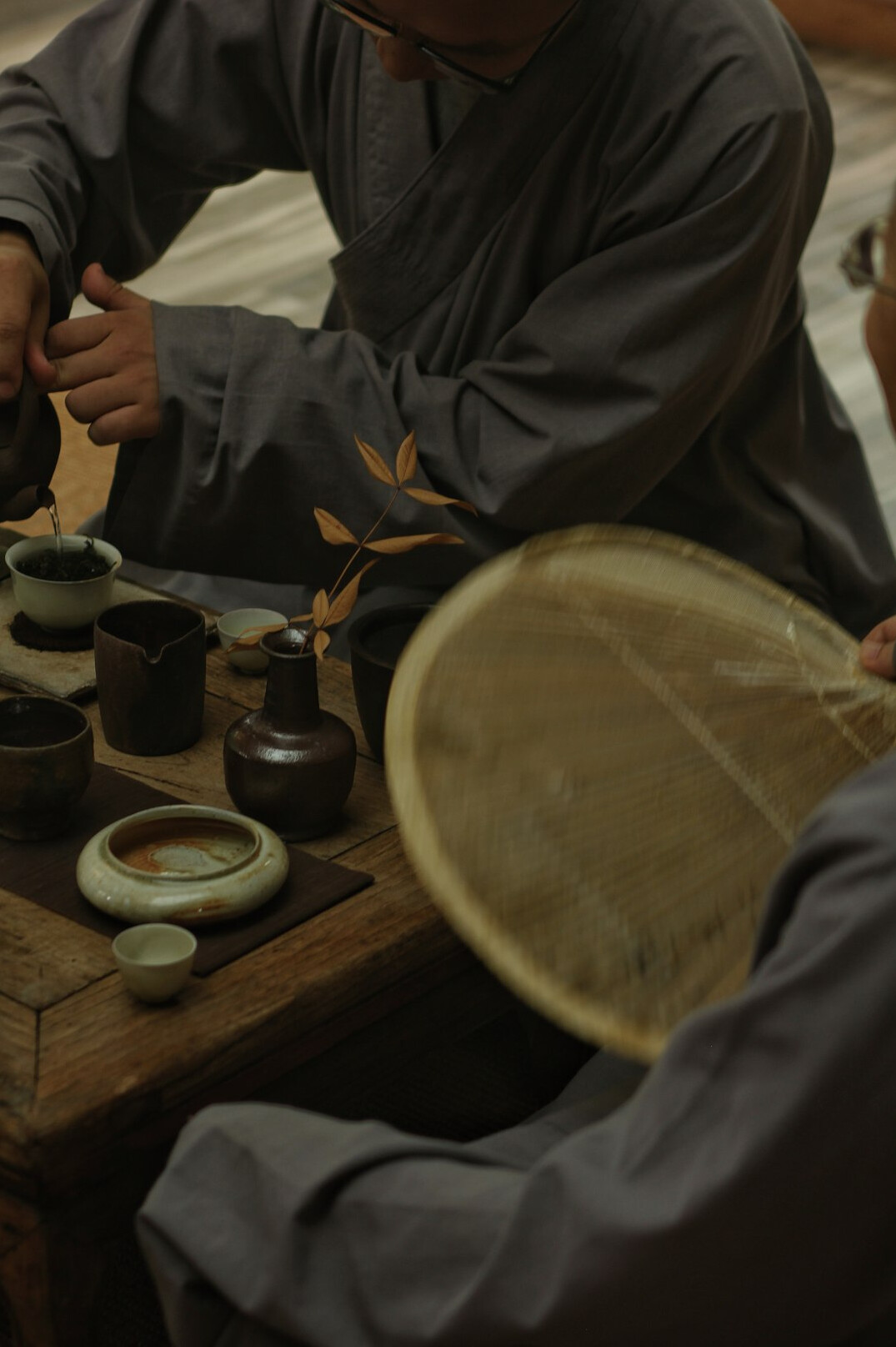 Japanese seniors participating in a traditional tea ceremony class