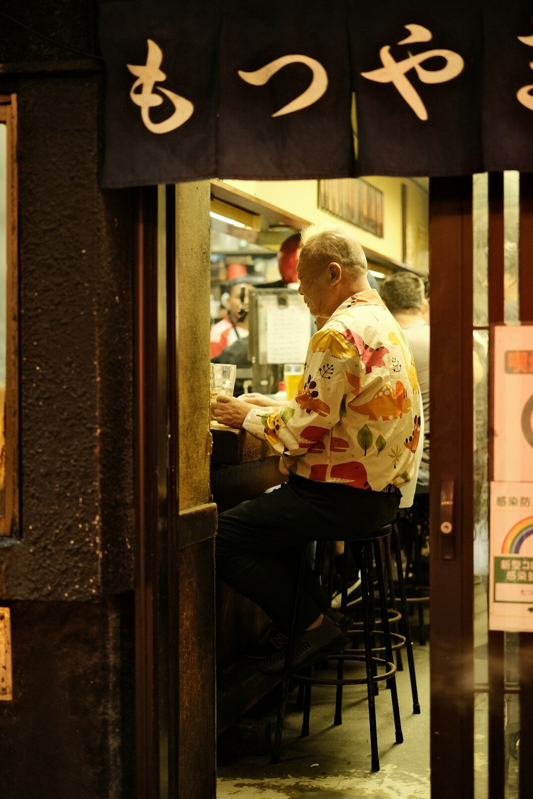 Japanese senior couple enjoying a meal together at a restaurant