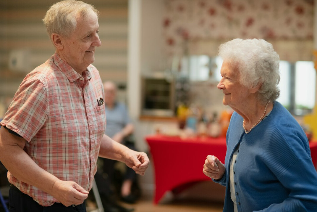 senior people smiling in club
