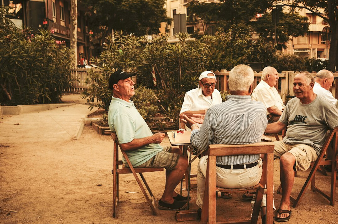 group of seniors playing cards