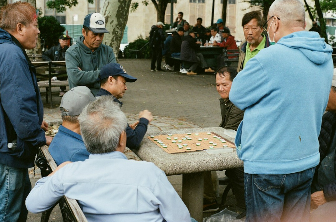 elderly group playing board games